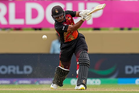 Kipling Doriga plays a shot against WI